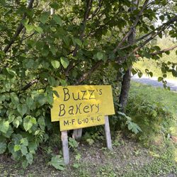 Buzz's Bakery - Check for hours of operation. The sign outside the driveway to Buzz's Bakery.