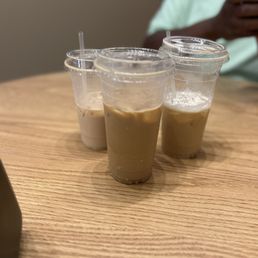 Iced coffee, cold brew, and a latte on a hot summer day.