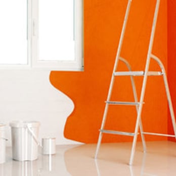 4M Construction - a ladder leaning against an orange wall - General Contractors Near Me - Brooklyn, New York