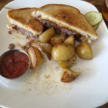Sage Creek Grille - Wavy burger with potato wedges - American Near Me - Custer, South Dakota Sage Creek Grille - Wavy burger with potato wedges - American Near Me - Custer, South Dakota