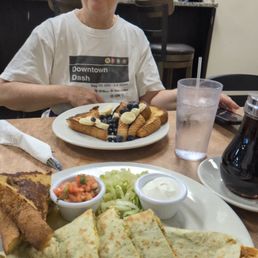 Guacamole and other sauces with cheese enchiladas and French toast Guacamole and other sauces with cheese enchiladas and French toast