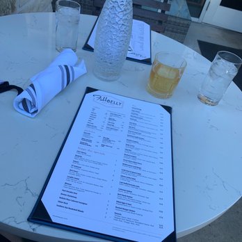 Full Belly - Outside, whistle pig rye,menu, table water decanter - Breakfast & Brunch Near Me - San Antonio, Texas Full Belly - Outside, whistle pig rye,menu, table water decanter - Breakfast & Brunch Near Me - San Antonio, Texas