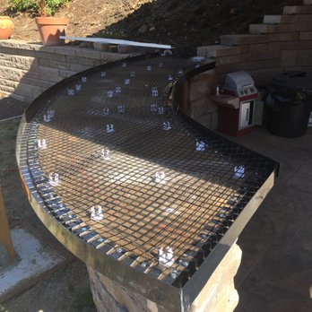 Catalano Builder - a barbecue grill being built - General Contractors Near Me