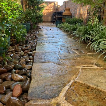 Lawnsmith - a stone path in a back yard - Landscaping Near Me Lawnsmith - a stone path in a back yard - Landscaping Near Me