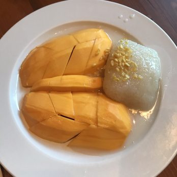 Aroy Thai Restaurant - Mango sticky rice topped with fried mung bean, yum - Thai Near Me - Chicago, Illinois Aroy Thai Restaurant - Mango sticky rice topped with fried mung bean, yum - Thai Near Me - Chicago, Illinois