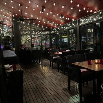 Sfoglina Van Ness - "Outside" seating. There are heaters in there. Very cozy and festive for the holidays! - Italian Near Me - Washington, DC, District of Columbia Sfoglina Van Ness - "Outside" seating. There are heaters in there. Very cozy and festive for the holidays! - Italian Near Me - Washington, DC, District of Columbia