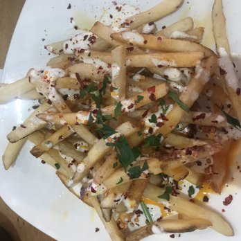 Jack's Urban Eats - Urban fries - blue cheese, spicy chili oil and chili flakes - American Near Me - Rancho Cordova, California Jack's Urban Eats - Urban fries - blue cheese, spicy chili oil and chili flakes - American Near Me - Rancho Cordova, California
