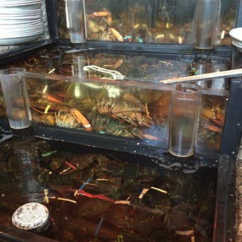 Hemenway's Restaurant - 3-tier lobster tank in the waiting area. - Seafood Near Me - Providence, Rhode Island