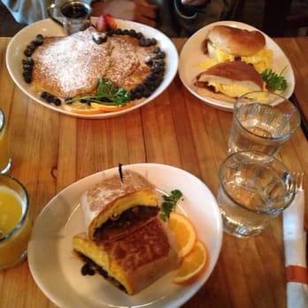 The Park View - Buttermilk pancakes, Black bean burrito, and an egg sandwich with fresh OJ. - New American Near Me - New York, New York The Park View - Buttermilk pancakes, Black bean burrito, and an egg sandwich with fresh OJ. - New American Near Me - New York, New York