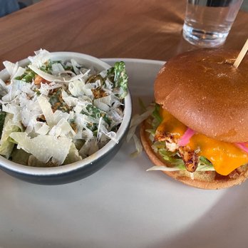 LOCAL Public Eatery River District - Blackened chicken sandwich with salad - Sports Bars Near Me - Vancouver, British Columbia