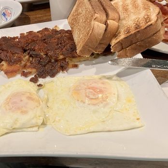 The Bistro At Haddonfield - Eggs over medium with well done potatoes and crispy bacon - American Near Me - Haddonfield, New Jersey