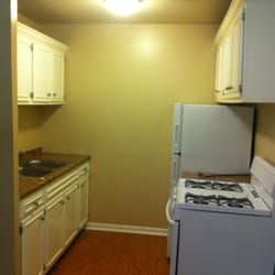 The Preserve at Woodfield - Trinity Property Management - Kitchen in a one-bedroom.