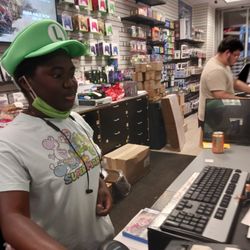 Gamestop - This was the woman and the man beside her.