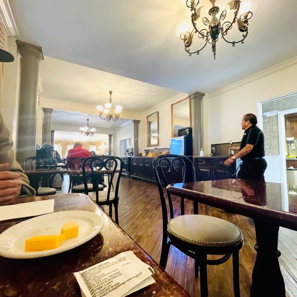 Victorian Inn - Wine and cheese hour. The gentleman in the picture is very friendly. - Hotels Near Me - Monterey, California Victorian Inn - Wine and cheese hour. The gentleman in the picture is very friendly. - Hotels Near Me - Monterey, California