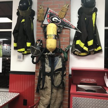 Firehouse Subs - Fireman protective clothing as decor - Fast Food Near Me - Athens, Georgia Firehouse Subs - Fireman protective clothing as decor - Fast Food Near Me - Athens, Georgia