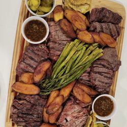 Wild Fork - Steak stastinf platter: elk, ostrich, bison, ribeye, pork chops, bananas