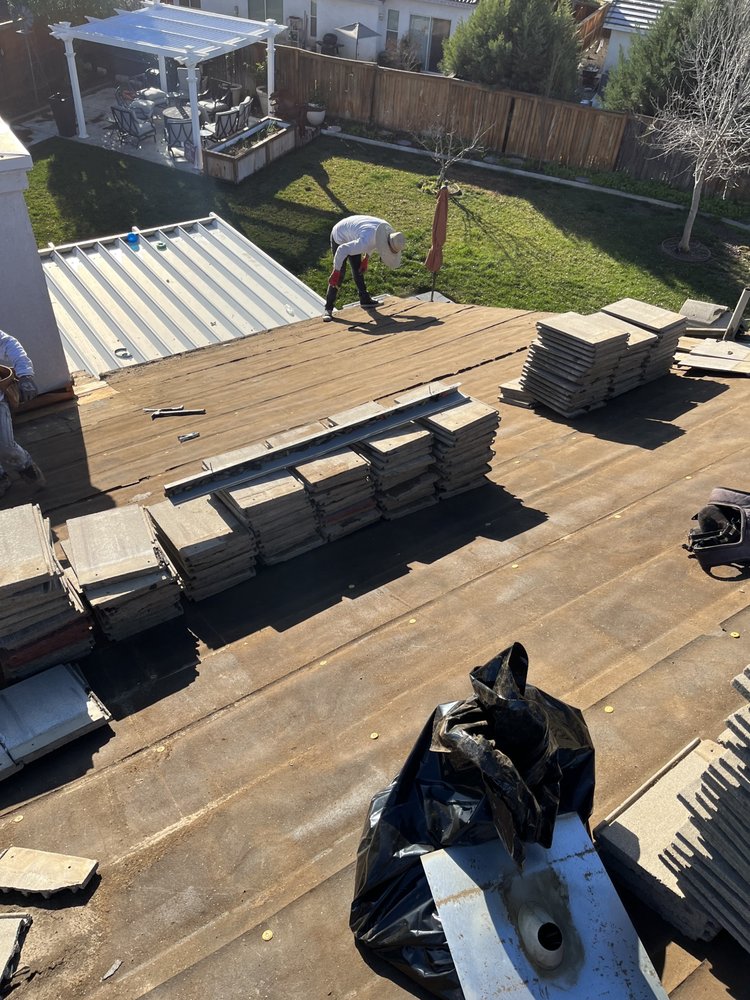 Slide of Nunez Roofing