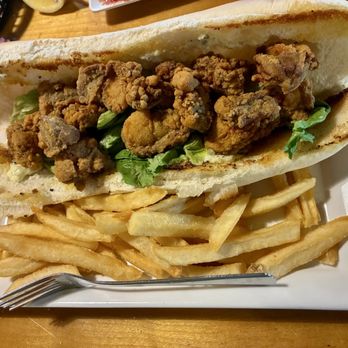 Crawfish Town USA - Whole oyster poboy. You have to add pickles onion and tomato. Lesson for next time - Cajun/Creole Near Me - Breaux Bridge, Louisiana Crawfish Town USA - Whole oyster poboy. You have to add pickles onion and tomato. Lesson for next time - Cajun/Creole Near Me - Breaux Bridge, Louisiana