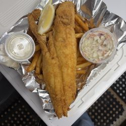SJ’s Sea Shack - We can pack things up to go, this is our large fish and chips.