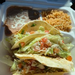 Ground beef 3 taco combo plate with rice and beans. Ground beef 3 taco combo plate with rice and beans.