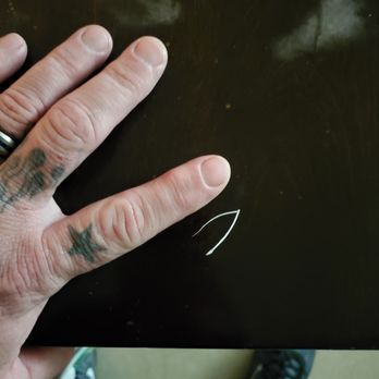 Dunkin' -  a person's hand with a tattoo on it - Coffee & Tea Near Me - Ocala, Florida
