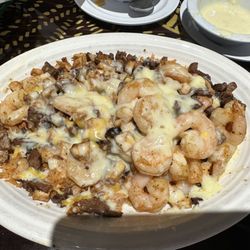 El Patio Bar & Grill - Crazy rice with shrimp steak & chicken.