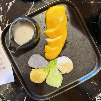 Four Region Thai Cuisine - Mango sticky rice - Thai Near Me - Spring, Texas Four Region Thai Cuisine - Mango sticky rice - Thai Near Me - Spring, Texas