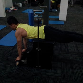 Posture plus Fitness - playing with the wonder machine, post reformer - Gyms Near Me - Bulimba, QLD