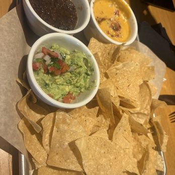 Twin Peaks - Triple play- avocado snag, fire roasted salsa and chipotle queso. - New American Near Me - Tempe, Arizona Twin Peaks - Triple play- avocado snag, fire roasted salsa and chipotle queso. - New American Near Me - Tempe, Arizona