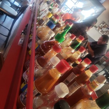 Fronk's - SO many sauces on board here. - Burgers Near Me - Bellflower, California