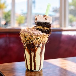 Eats Burgers - Eats Burgers' Dubai Chocolate Milkshake blends chocolate, pistachio and crispy kataifi, topped with chocolate drizzle, crunch...