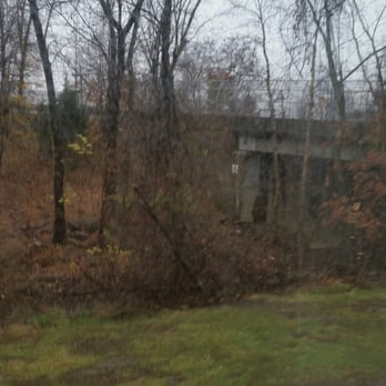 Beaver Brook Gardens - Fallen trees left on grounds of Beaver Brook Gardens by the brook, Comly Rd, and building A. Grass isn't maintained. - Apartments Near Me - Lincoln Park, New Jersey Beaver Brook Gardens - Fallen trees left on grounds of Beaver Brook Gardens by the brook, Comly Rd, and building A. Grass isn't maintained. - Apartments Near Me - Lincoln Park, New Jersey