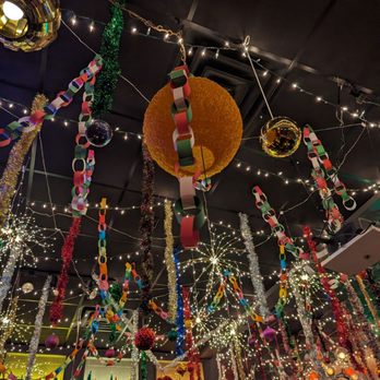 The Trap Room - christmas decorations hanging from the ceiling - Lounges Near Me - Omaha, Nebraska