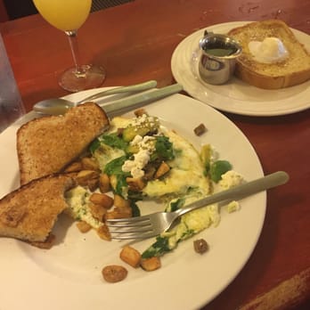 Eggtc. - Wheat toast, spinach, eggs whites omelette and a side order of their French toast (Raisin). - Breakfast & Brunch Near Me - Kansas City, Missouri Eggtc. - Wheat toast, spinach, eggs whites omelette and a side order of their French toast (Raisin). - Breakfast & Brunch Near Me - Kansas City, Missouri