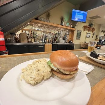 Cypress Creek Grill - Crab cake sandwich with seasoned rice and cold pint on a hot summer's day - American Near Me - Elizabeth City, North Carolina Cypress Creek Grill - Crab cake sandwich with seasoned rice and cold pint on a hot summer's day - American Near Me - Elizabeth City, North Carolina