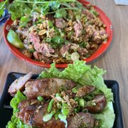 Photo of Spicy Joi Banh Mi-Noodles-Lao Street Food - Concord, CA, United States. Nam Khao 2 Sausage Links mild