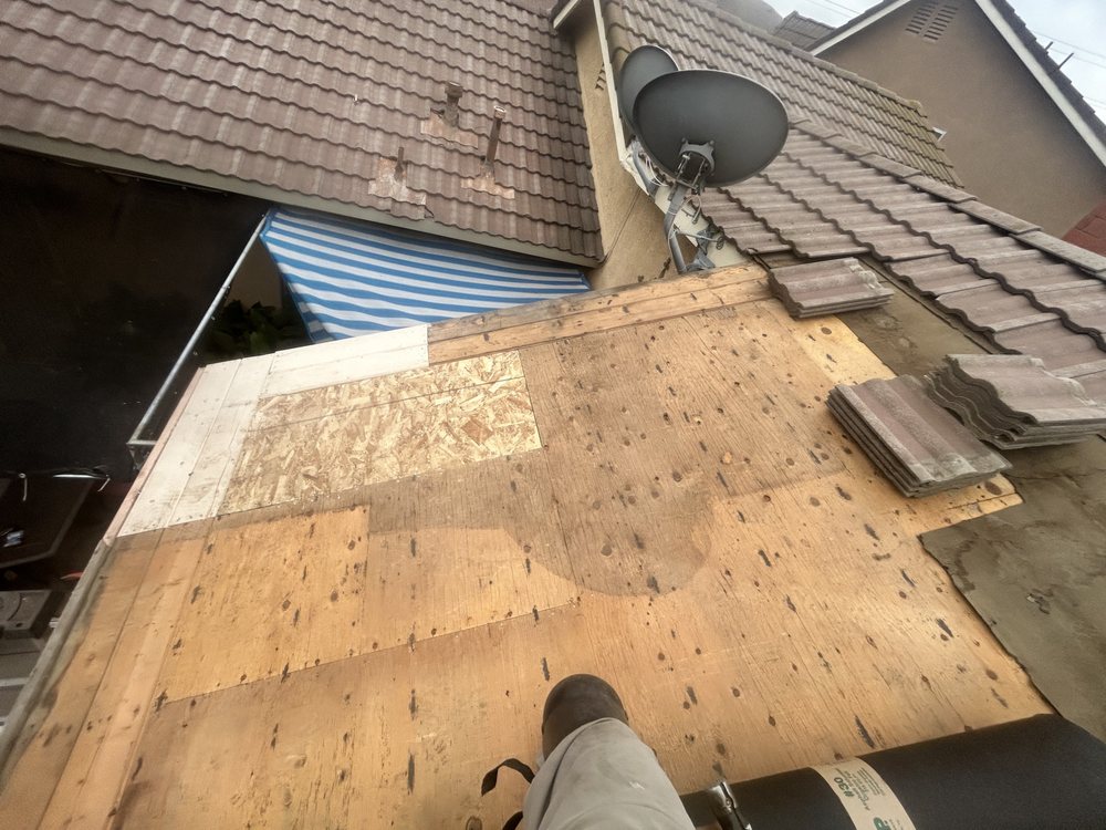 Slide of Mj Cali Roofing