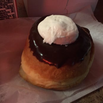 Dandee Donut Factory - Chocolate spotlight. Light and airy donut, rich chocolate frosting and a hearty dollop of vanilla cream. Amazing! - Donuts Near Me - Pompano Beach, Florida