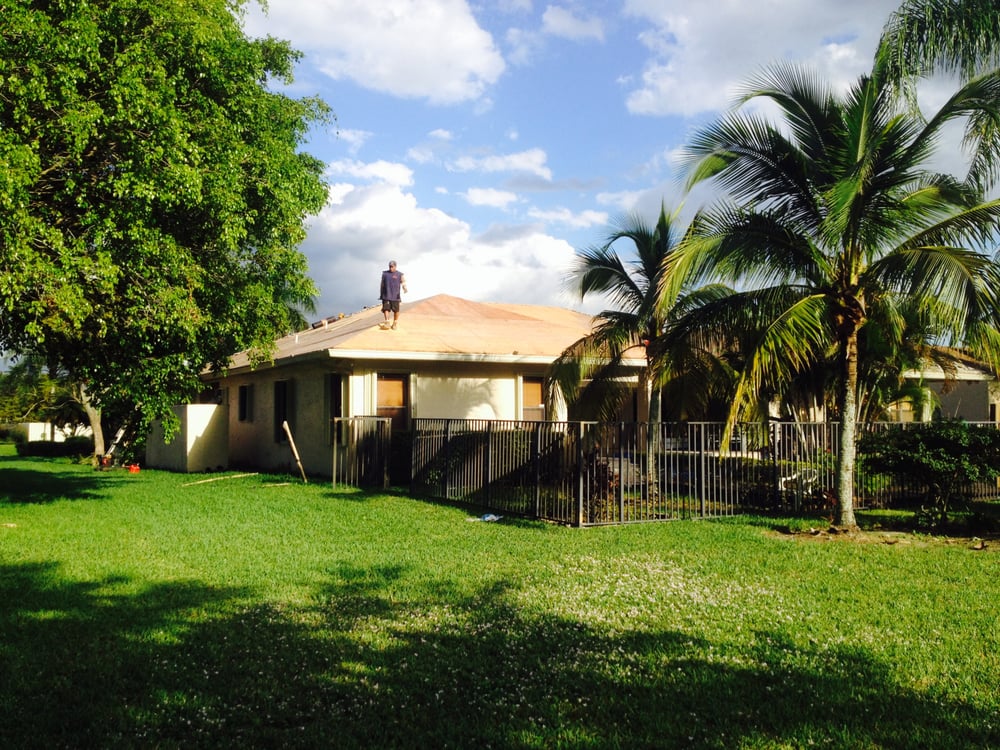 Slide of Thompsons Roofing