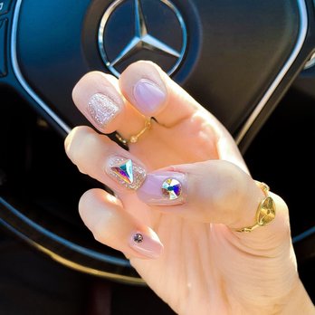 Nail J - 2 weeks out. No lifting, peeling, stones did not budge or get stuck in my hair, and soooo many compliments. - Nail Salons Near Me - Buena Park, California