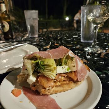 Villa Capri - Brushetta with Artichoke Hearts & Mozzarella topped with Prosciutto. - Italian Near Me - Seabrook, Texas Villa Capri - Brushetta with Artichoke Hearts & Mozzarella topped with Prosciutto. - Italian Near Me - Seabrook, Texas