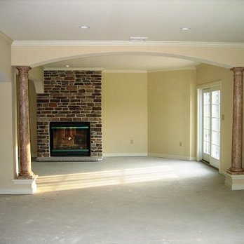Smart Home Solutions - an empty living room with a fireplace - General Contractors Near Me - Edmonton, Alberta Smart Home Solutions - an empty living room with a fireplace - General Contractors Near Me - Edmonton, Alberta