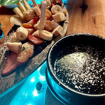 Enchanted Forest - 2nd photo of chocolate fondue- I think it's a dark chocolate fondue or a combo. - Salad Near Me - Placerville, California