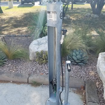 Valero Park Trailhead - Bike stand with air pump and tools for minor repairs. - Parks Near Me - San Antonio, Texas