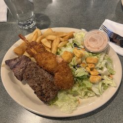 Special: sirloin steak, 3 coconut shrimps, fries, & side salad.