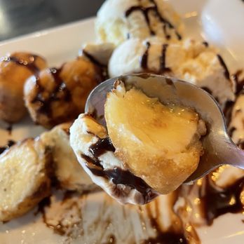 Coconut Thai - Fried bananas with coconut ice cream and chocolate drizzle - Thai Near Me - Edina, Minnesota Coconut Thai - Fried bananas with coconut ice cream and chocolate drizzle - Thai Near Me - Edina, Minnesota