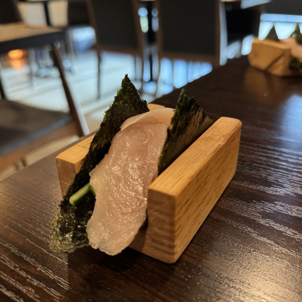 Akashiro - $9 YELLOWTAIL HANDROLL: different from a normal handroll, fell apart easily, big slices of fish. Nothing special. - Sushi Bars Near Me - Fullerton, California
