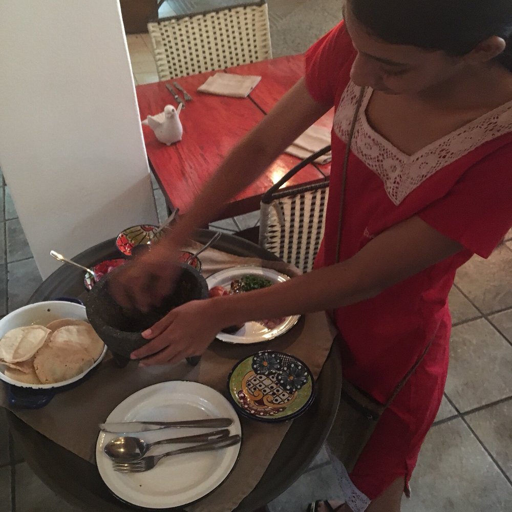 Merida Grill - Table side preparation of salsa - Mexican Near Me - Puerto Vallarta, JAL