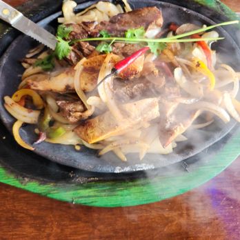 Lalo’s - Steaming hot mixed fajitas for one - Mexican Near Me - Montgomery, Texas