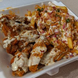 Markham Special ; Spicy Garlic Parm Wings with Chili Onion Fries Markham Special ; Spicy Garlic Parm Wings with Chili Onion Fries